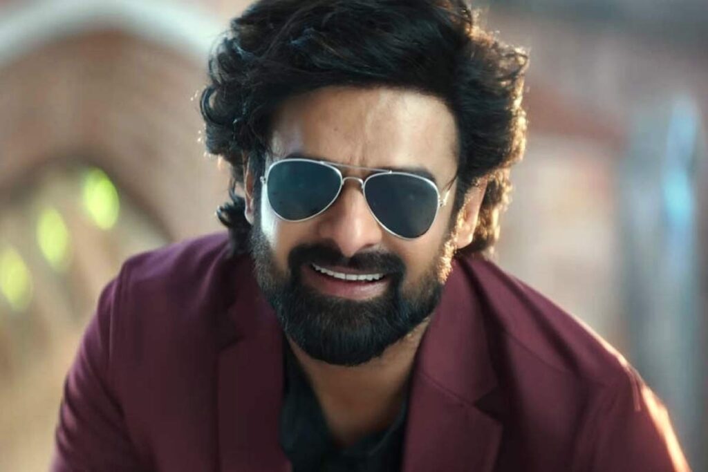 Prabhas smiles with his glasses on