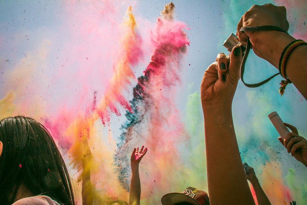 People are throwing holi colors